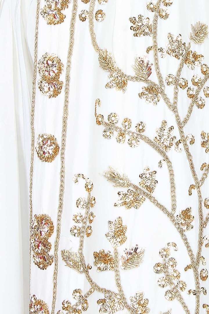 Ivory and gold floral embroidered jacket, bustier and dhoti skirt set available only at Pernia's Pop Up Shop.