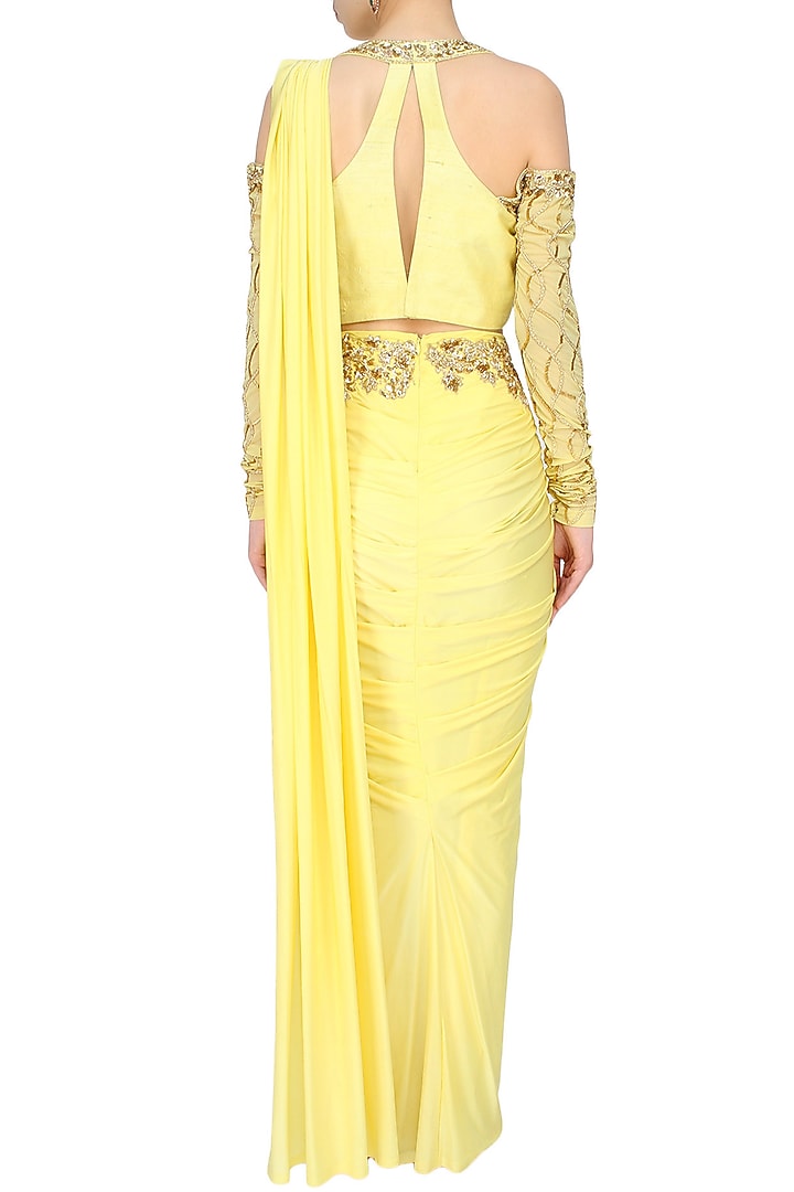 Yellow and gold floral embroidered drape saree with drop shoulder blouse available only at Pernia's Pop Up Shop.