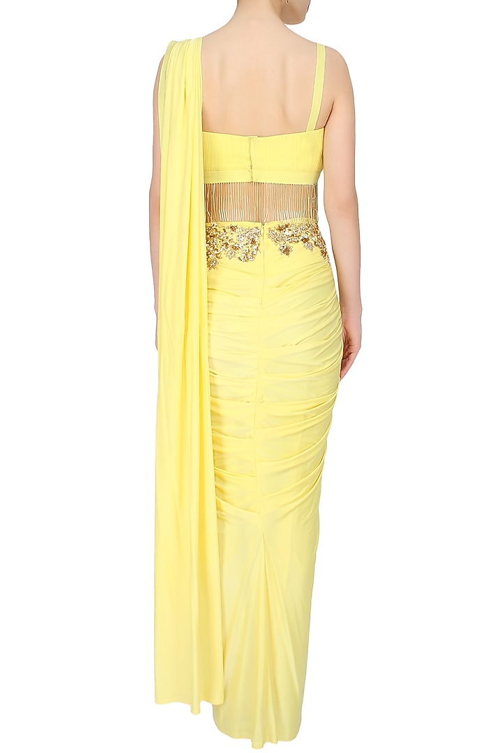 Yellow and gold floral embroidered drape saree with starppy fringes blouse available only at Pernia's Pop Up Shop.