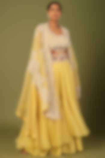 Yellow Organza Embroidered Cape Set by Minaxi Dadoo