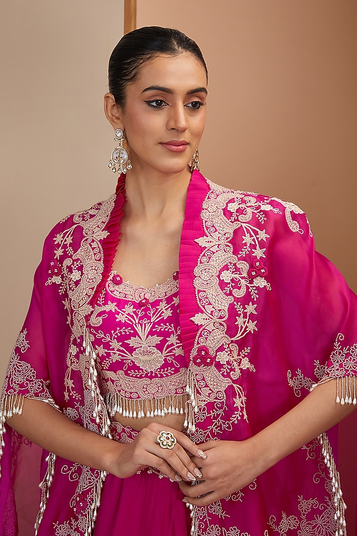 Rani Pink Organza & Silk Thread Embroidered Jacket Tiered Bridal Lehenga Set by Minaxi Dadoo at Pernia's Pop Up Shop