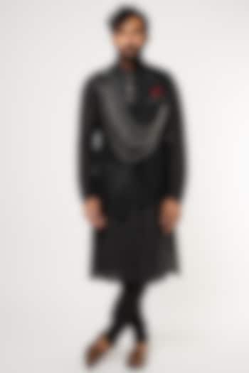 Black Kurta Set With Asymmetrical Nehru Jacket by Manish Nagdeo