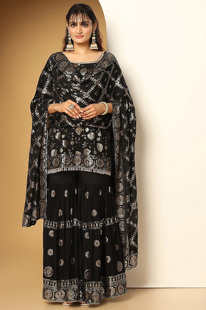 Black Chinon Chiffon Sequins Embroidered Sharara Set by MeenaGurnam at Pernia's Pop Up Shop