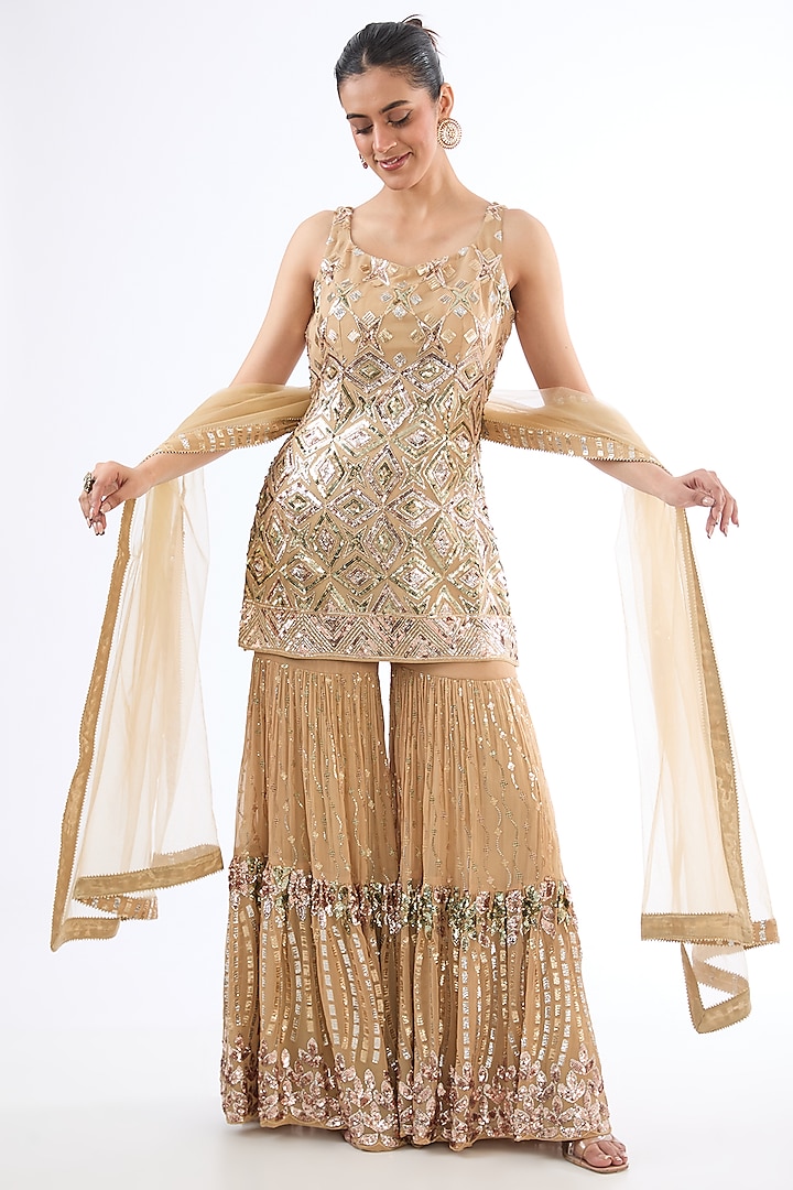 Golden Georgette Sequins Embroidered Sharara Set by MeenaGurnam