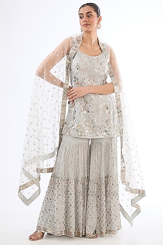 Grey Georgette Sequins Embroidered Sharara Set by MeenaGurnam