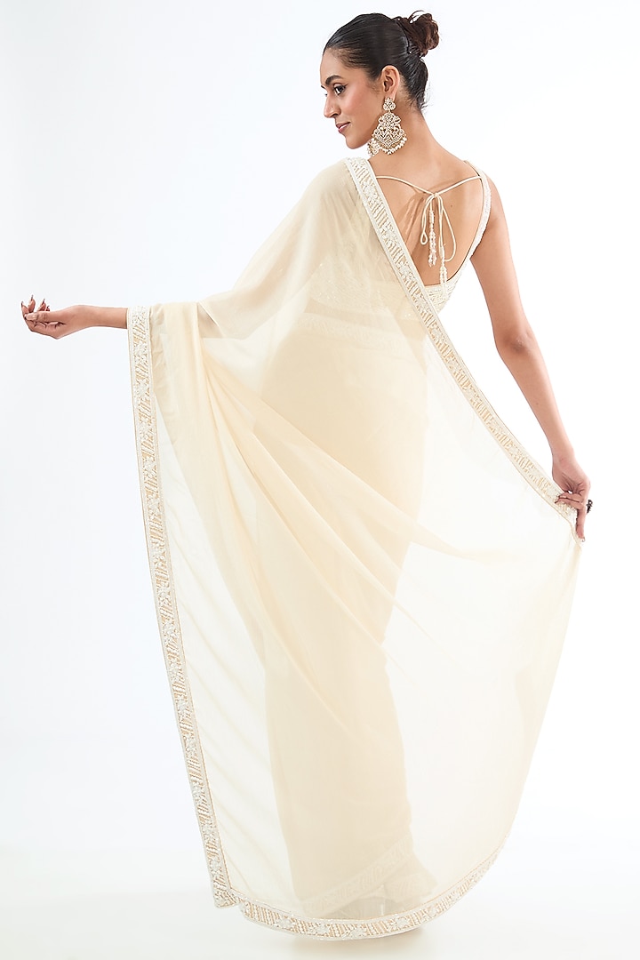 Ivory Georgette Sequins & Bead Embroidered Wedding Saree Set by MeenaGurnam at Pernia's Pop Up Shop