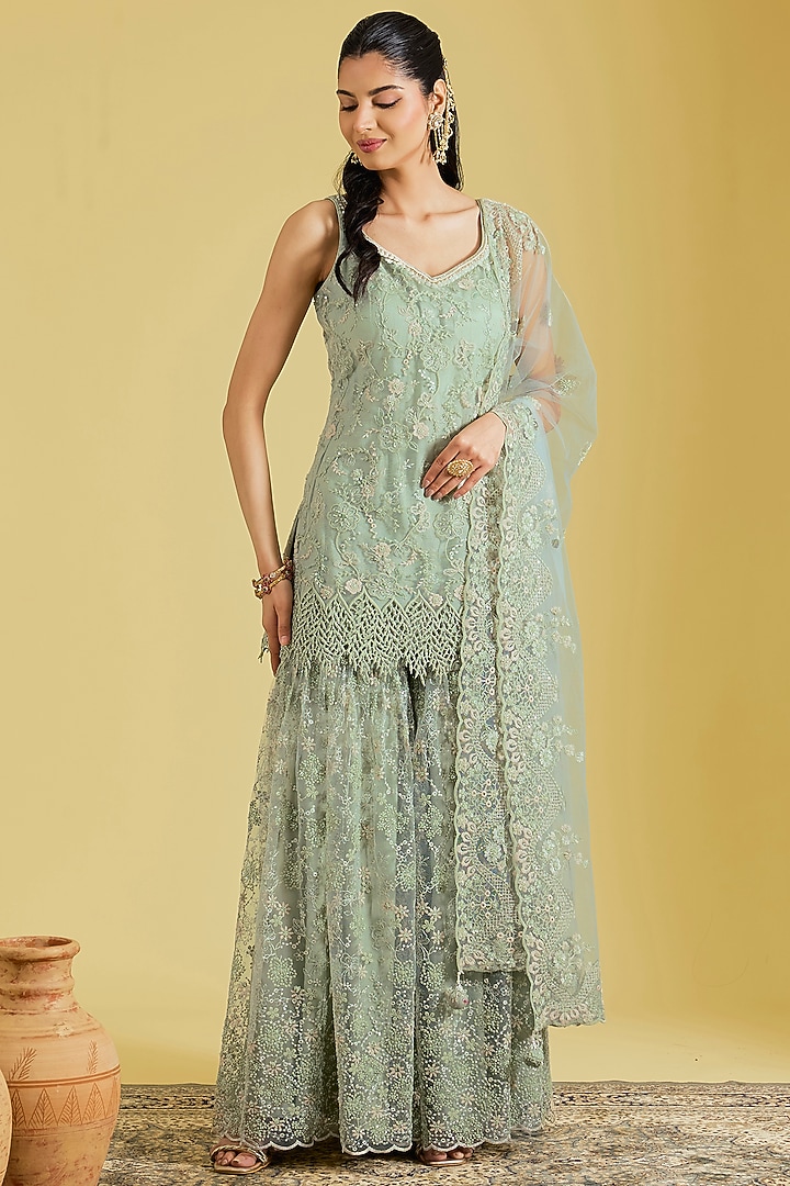 Pista Net Embroidered Gharara Set by MeenaGurnam at Pernia's Pop Up Shop
