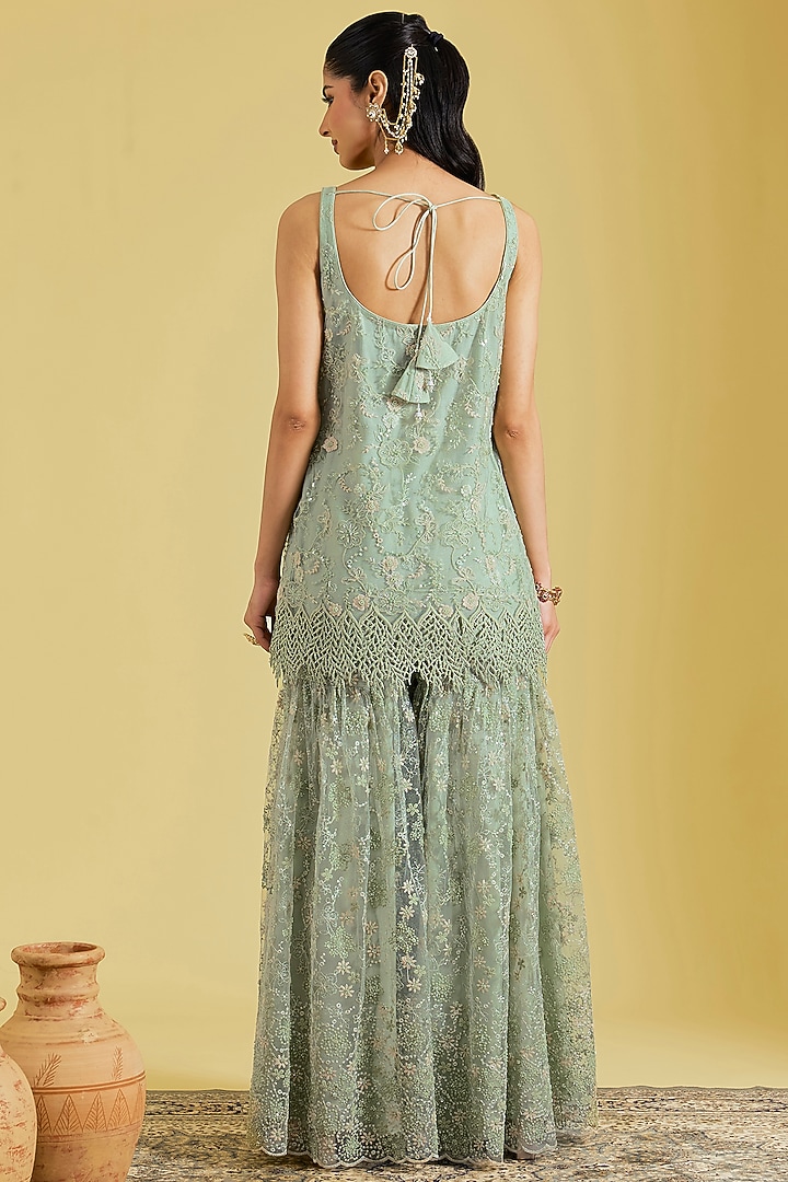 Pista Net Embroidered Gharara Set by MeenaGurnam at Pernia's Pop Up Shop