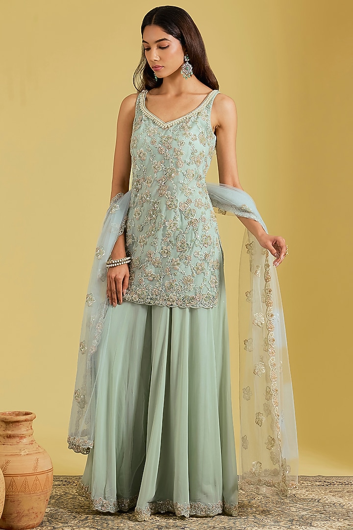 Pista Net Embroidered Gharara Set by MeenaGurnam at Pernia's Pop Up Shop