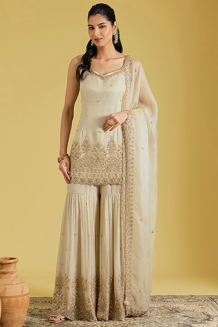 Beige Tissue Embroidered Gharara Set by MeenaGurnam at Pernia's Pop Up Shop