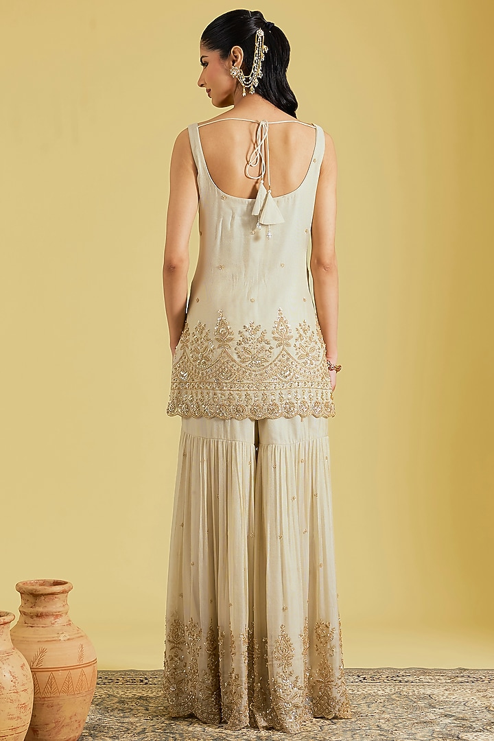 Beige Tissue Embroidered Gharara Set by MeenaGurnam at Pernia's Pop Up Shop