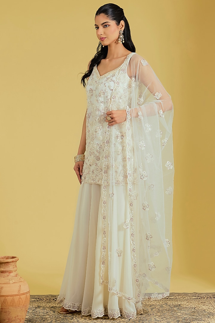 Ivory Net Embroidered Gharara Set by MeenaGurnam at Pernia's Pop Up Shop