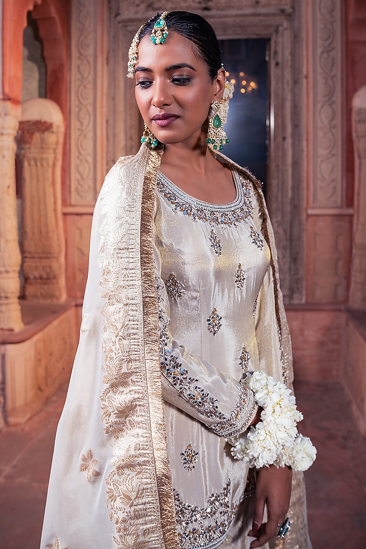 Ivory Jacquard Tissue Handcrafted Wedding Sharara Set by MeenaGurnam at Pernia's Pop Up Shop