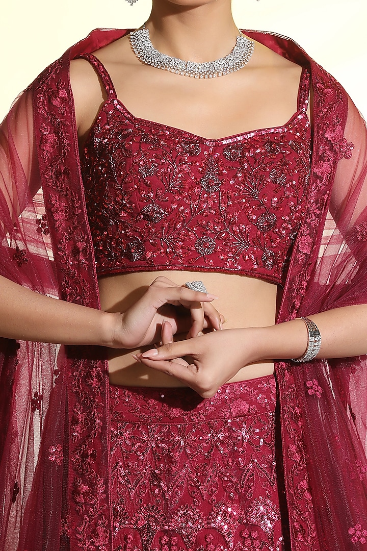 Maroon Net Sequins & Cutdana Embroidered Flared Wedding Lehenga Set by MeenaGurnam at Pernia's Pop Up Shop