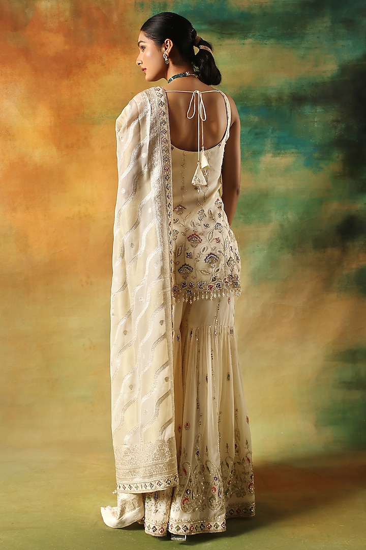 Ivory Organza Machine Embroidered Party Wear Sharara Set by MeenaGurnam at Pernia's Pop Up Shop