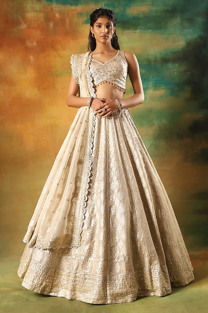 Gold Tissue Jacquard Mirror Embellished Wedding Lehenga Set by MeenaGurnam at Pernia's Pop Up Shop