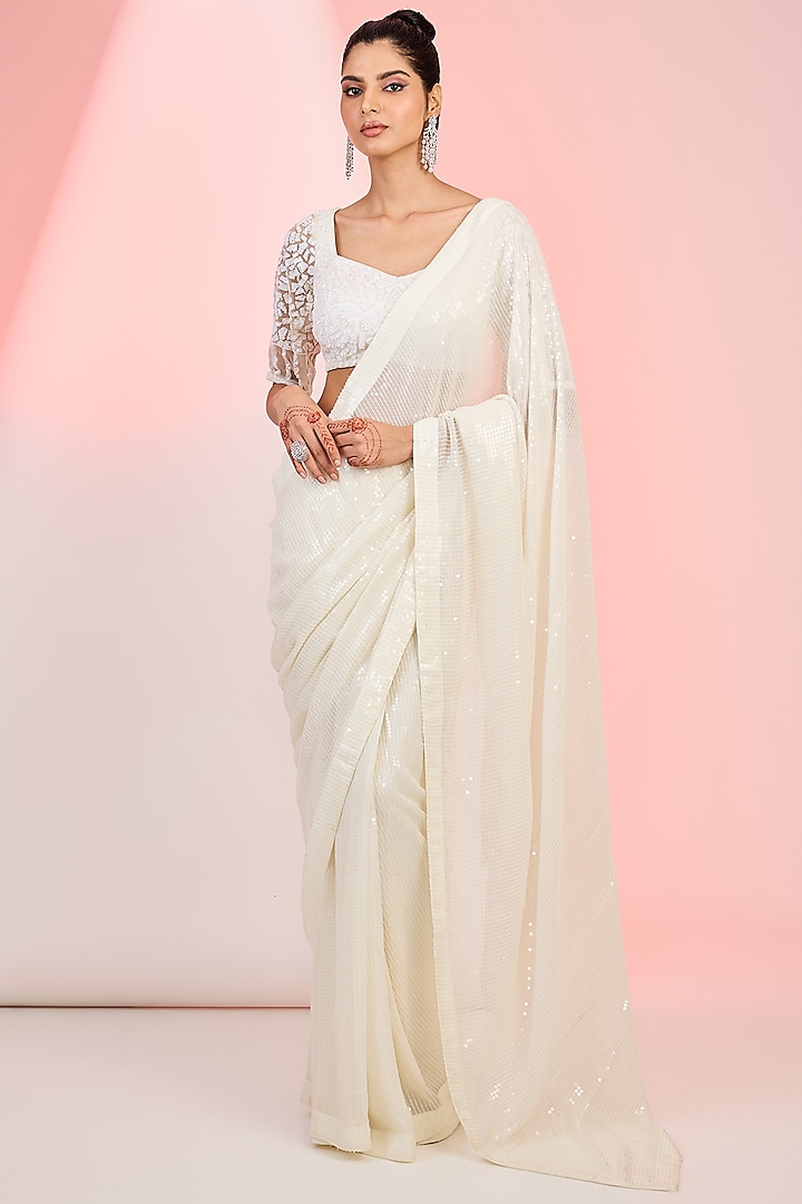 Ivory Georgette Sequins & Cutdana Hand Embellished Saree Set by MeenaGurnam at Pernia's Pop Up Shop