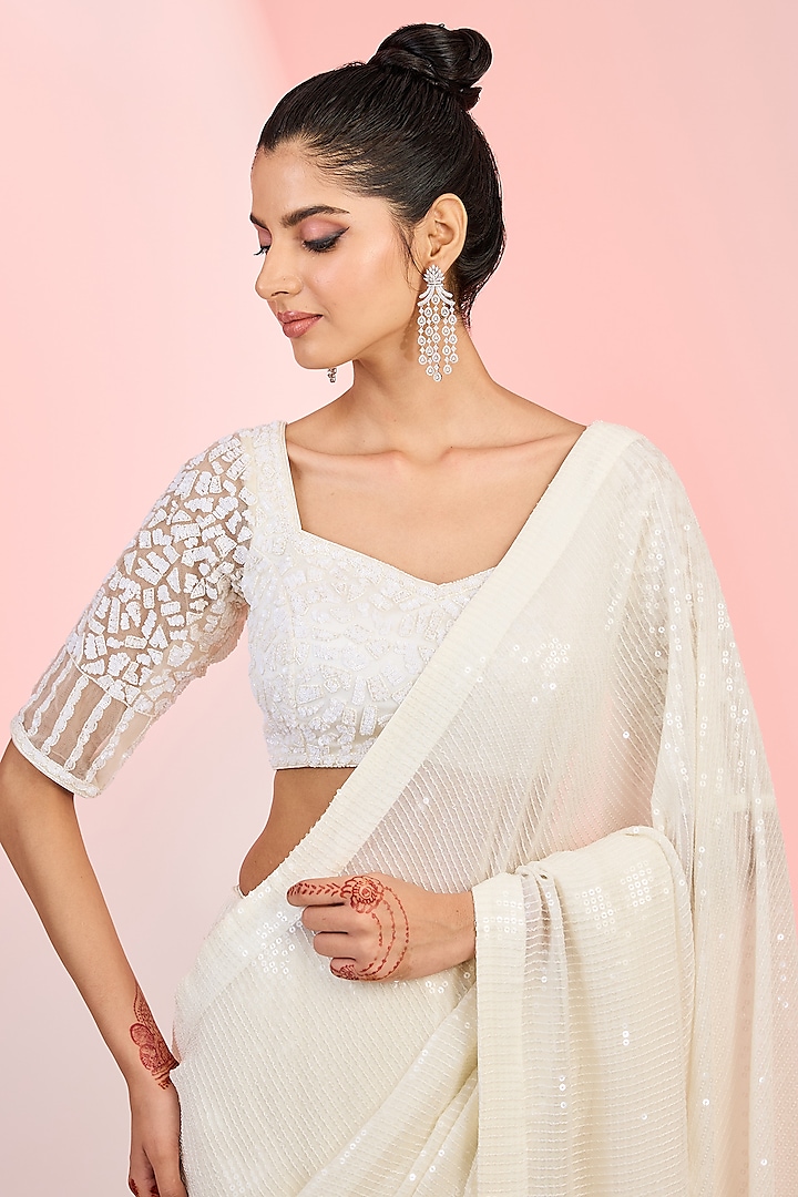 Ivory Georgette Sequins & Cutdana Hand Embellished Party Wear Saree Set by MeenaGurnam at Pernia's Pop Up Shop