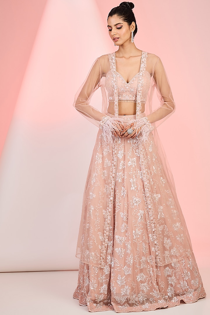 Peach Net Sequins Embroidered Jacket Lehenga Set by MeenaGurnam