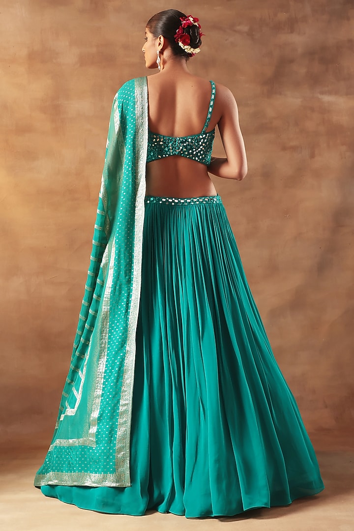 Teal Net & Georgette Threadwork Lehenga Set by MeenaGurnam at Pernia's Pop Up Shop