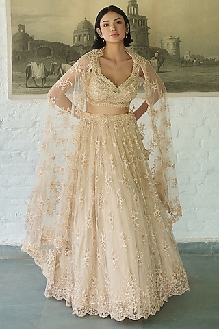 Ivory Net Resham Embellished Lehenga Set by MeenaGurnam