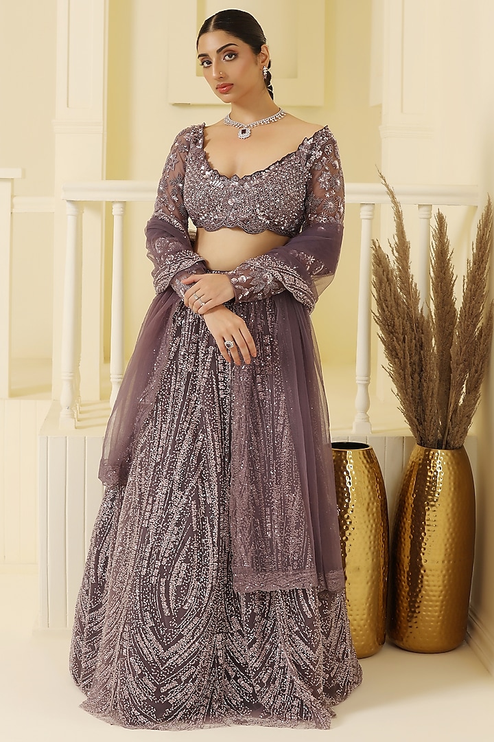 Mauve Net Sequins & Cutdana Hand Embellished Lehenga Set by MeenaGurnam