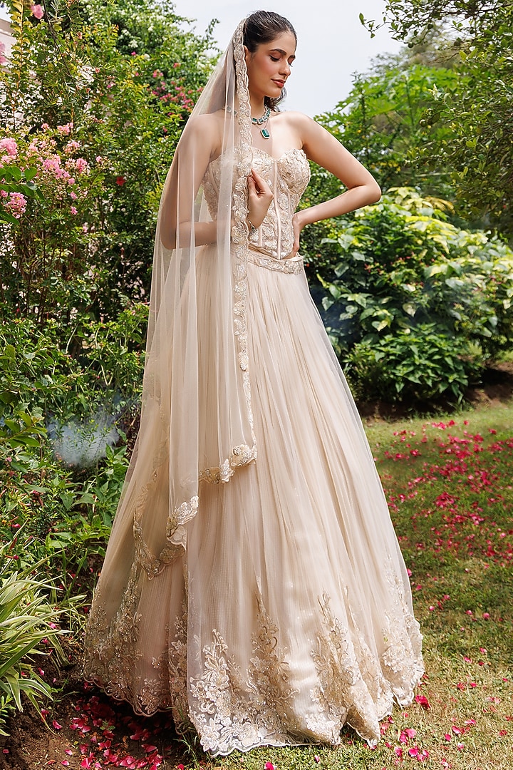 Golden Net 3D Floral Embellished Wedding Lehenga Set by MeenaGurnam at Pernia's Pop Up Shop