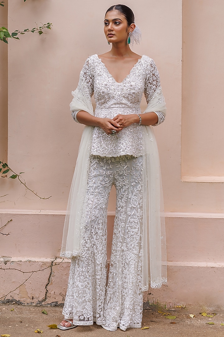 Pastel Ivory Net Floral Embroidered Bridal Sharara Set by MeenaGurnam at Pernia's Pop Up Shop