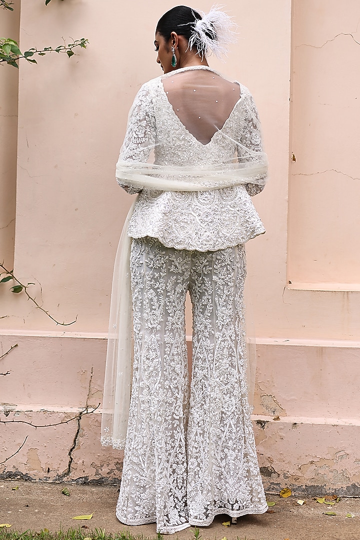 Pastel Ivory Net Floral Embroidered Bridal Sharara Set by MeenaGurnam at Pernia's Pop Up Shop