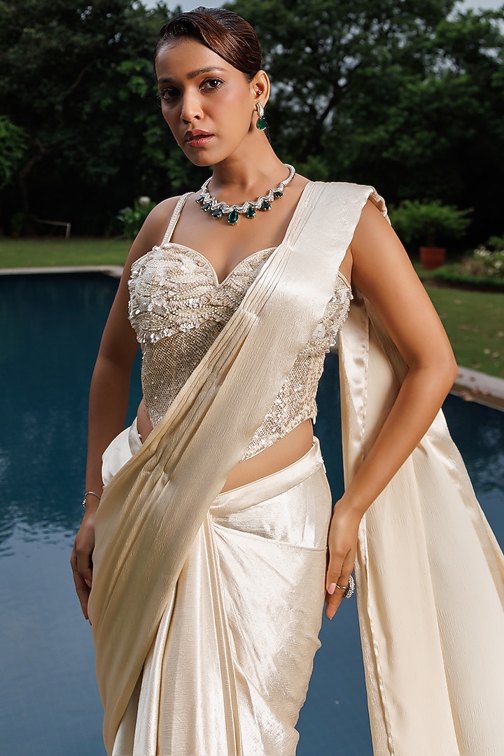 Ivory Crushed Satin Draped Party Wear Saree Set by MeenaGurnam at Pernia's Pop Up Shop