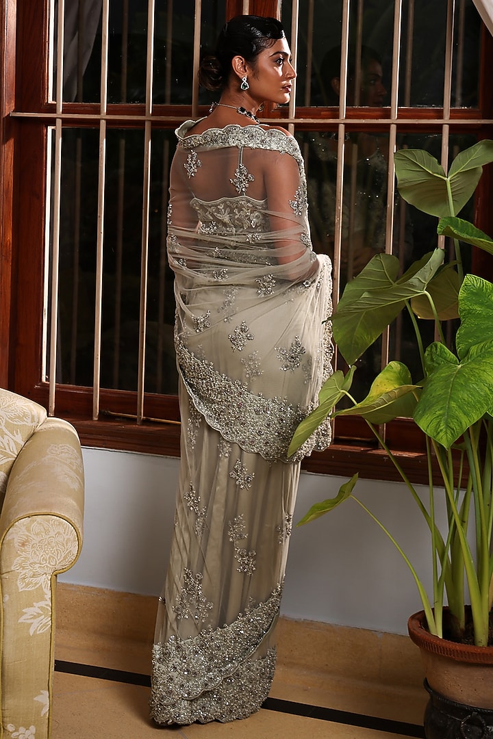 Pista Green Net Floral Embroidered Party Wear Saree Set by MeenaGurnam at Pernia's Pop Up Shop