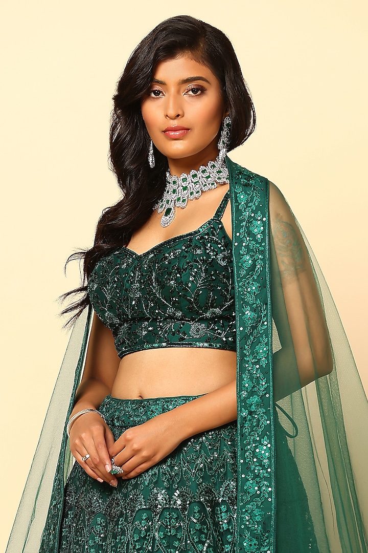 Bottle Green Net Sequin Embroidered Wedding Lehenga Set by MeenaGurnam at Pernia's Pop Up Shop