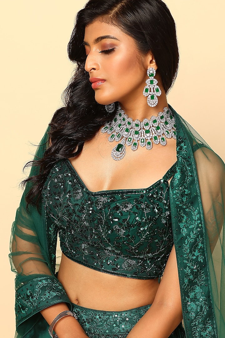 Bottle Green Net Sequin Embroidered Wedding Lehenga Set by MeenaGurnam at Pernia's Pop Up Shop