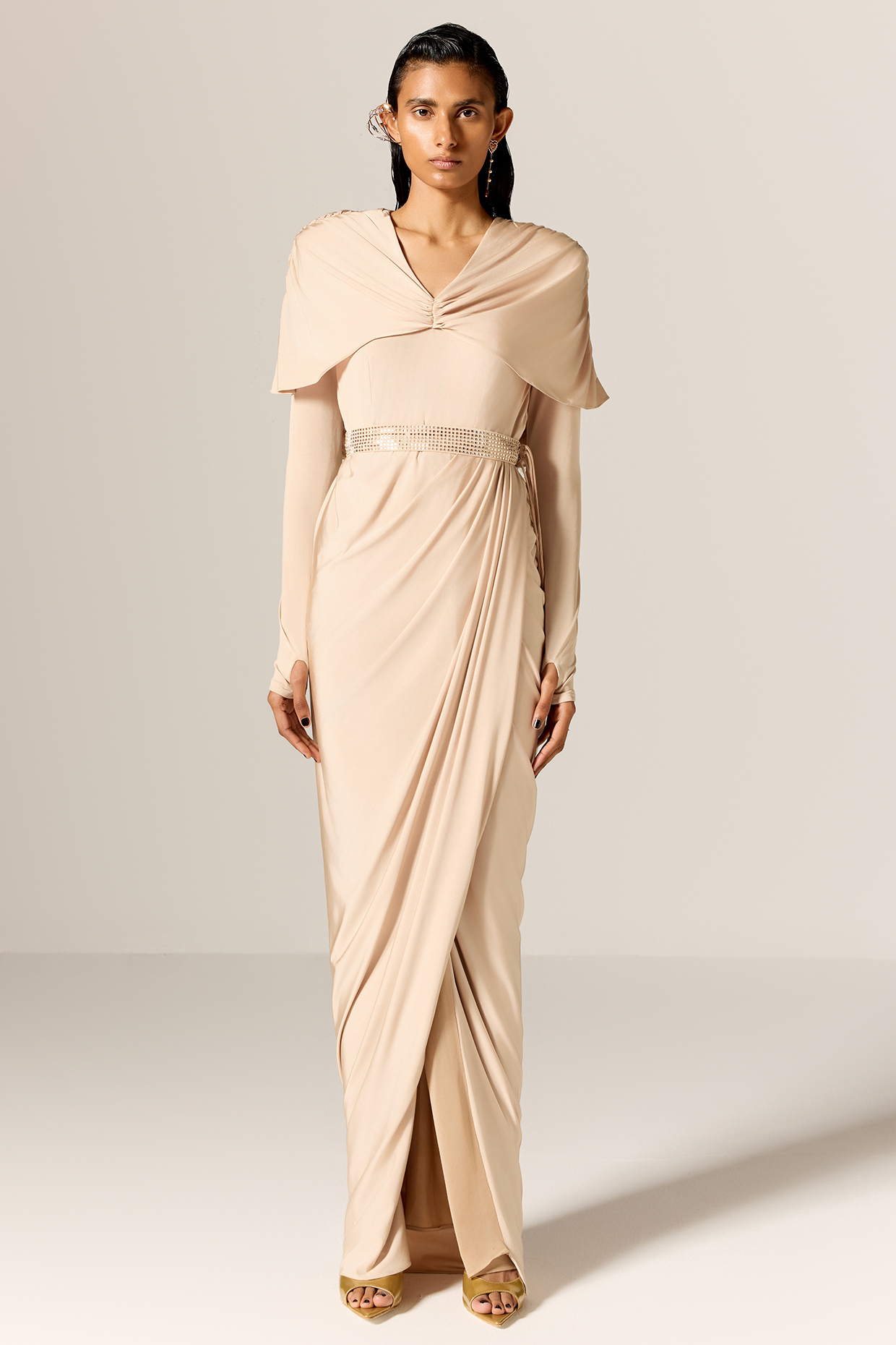 Pale Beige Butter Lycra Draped Cape Engagement Gown With Belt by Manika Nanda at Pernia's Pop Up Shop