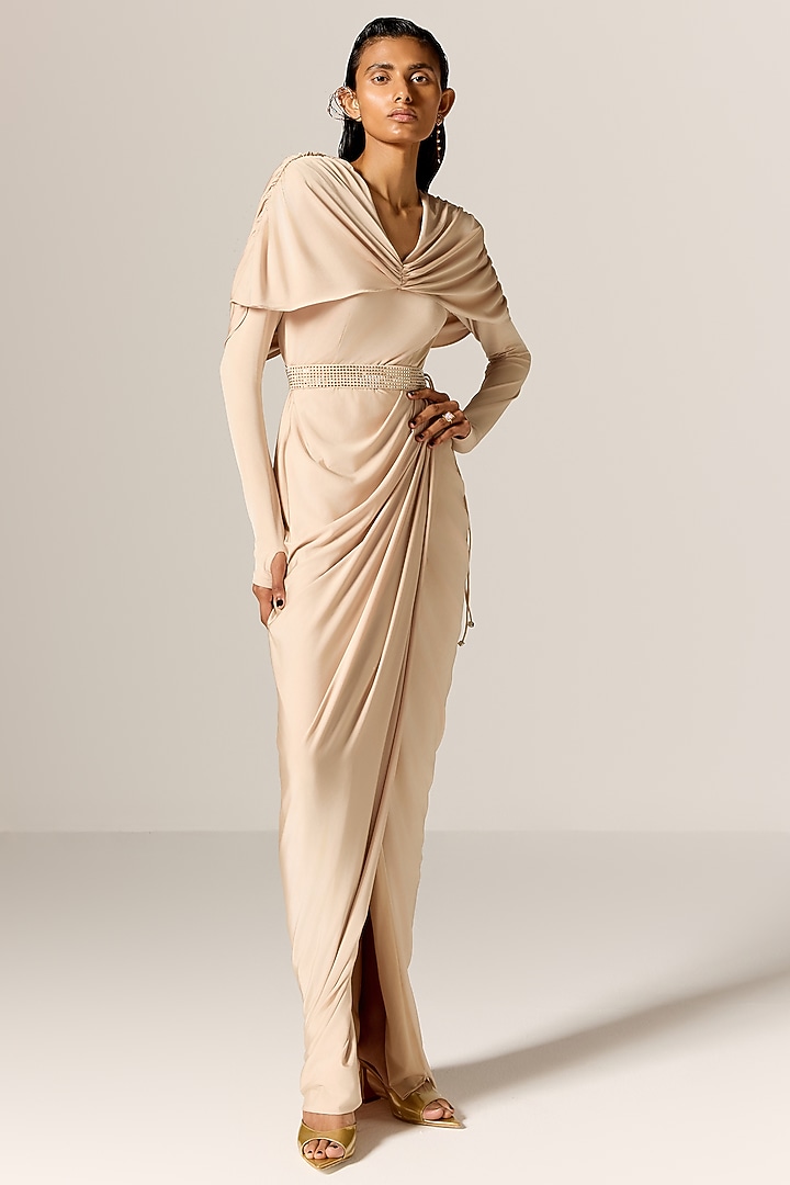 Pale Beige Butter Lycra Draped Cape Engagement Gown With Belt by Manika Nanda at Pernia's Pop Up Shop