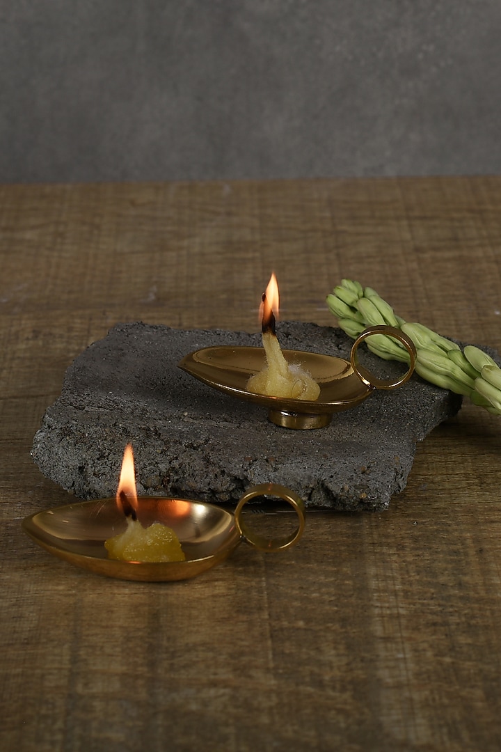 Gold Brass Spoon-Shaped Diya Holder by Manor House at Pernia's Pop Up Shop