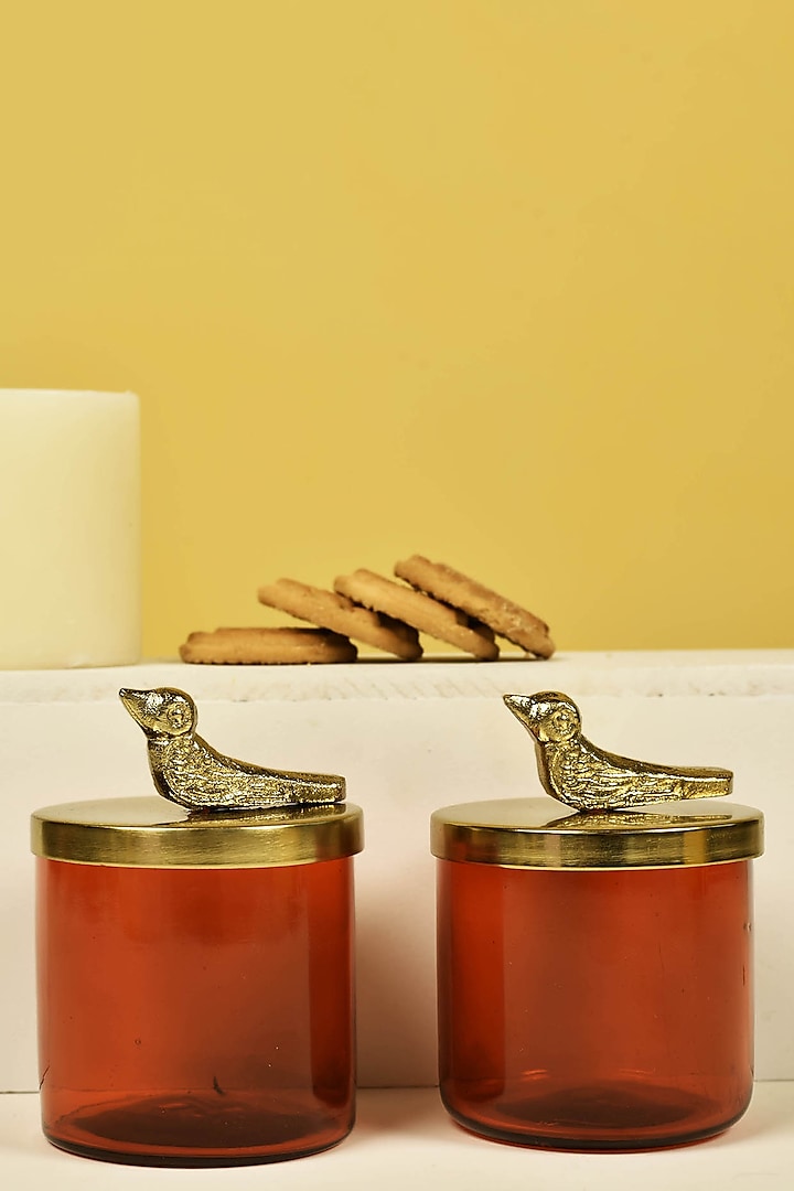 Red Glass Jars With Metal Bird Lid (Set of 2) by Manor House at Pernia's Pop Up Shop