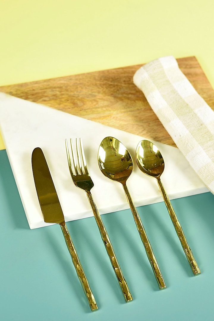 Gold Steel Cutlery Set (Set of 4) by Manor House at Pernia's Pop Up Shop