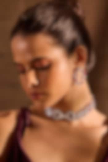 White Rhodium Finish Ruby Stone Stud Earrings by MNSH at Pernia's Pop Up Shop