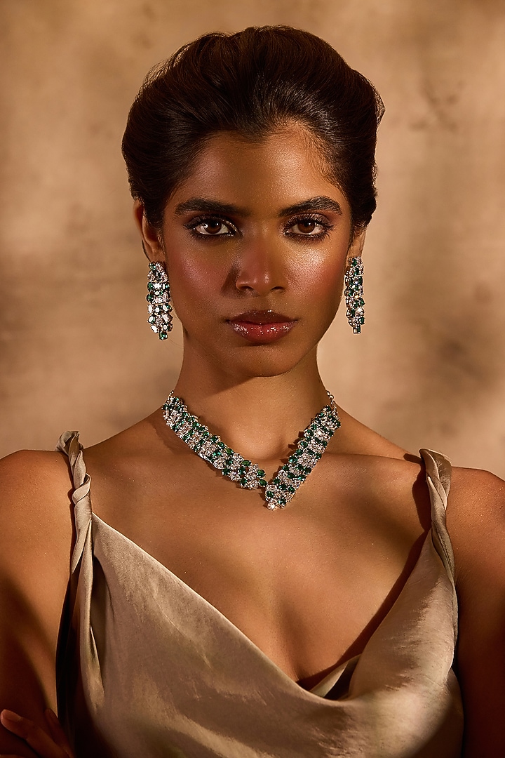 White Rhodium Finish Emerald Stone Dangler Earrings by MNSH at Pernia's Pop Up Shop