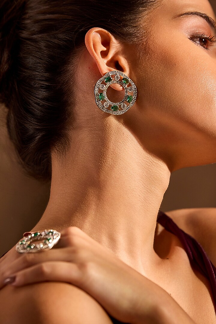 White Rhodium Finish Emerald Stone Dangler Earrings by MNSH at Pernia's Pop Up Shop