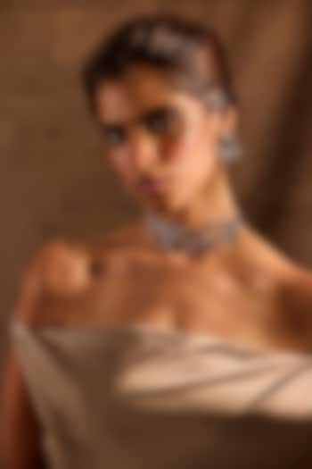 White Rhodium Finish Sapphire Stone Dangler Earrings by MNSH at Pernia's Pop Up Shop