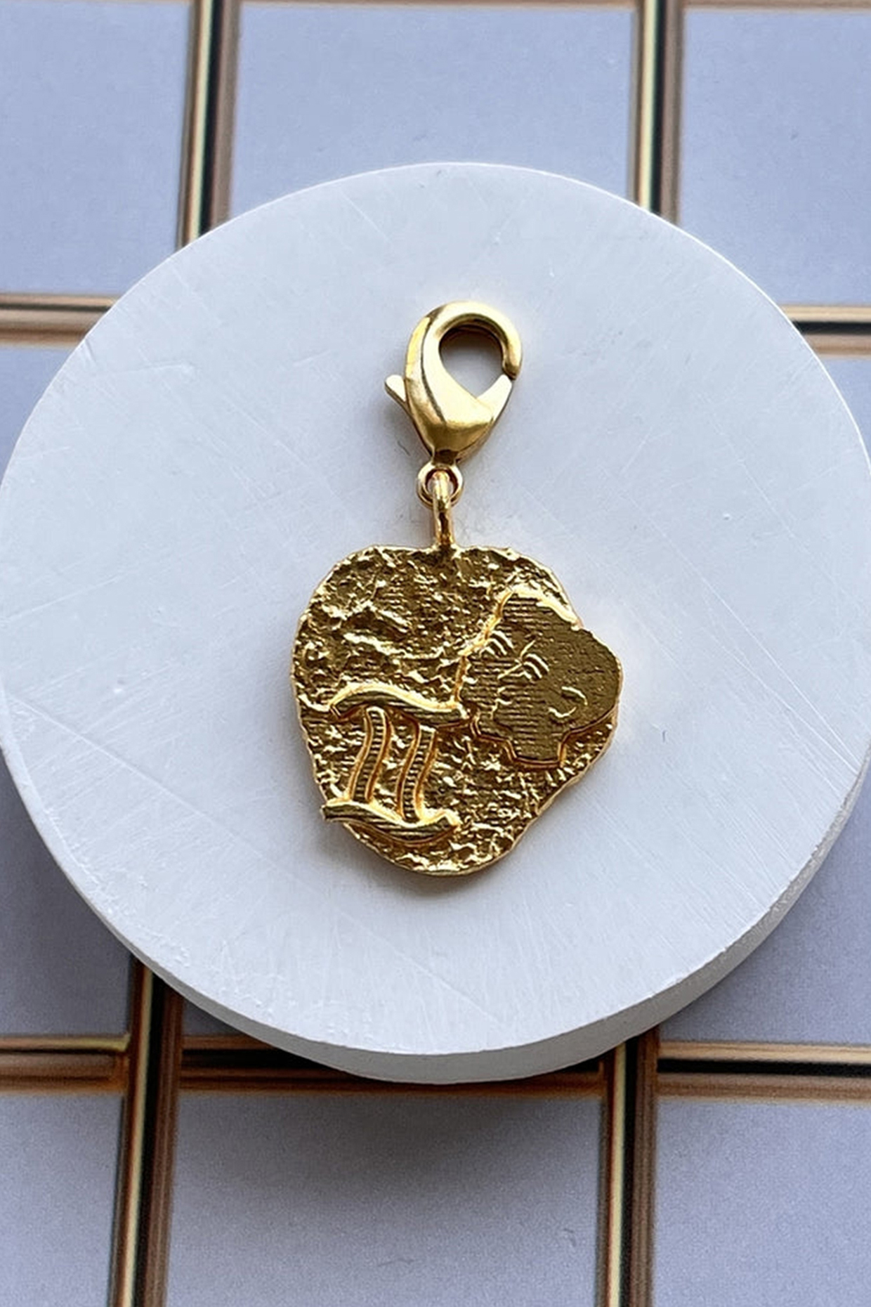 Gold Finish Zodiac Gemini Charm Bracelet by MNSH at Pernia's Pop Up Shop