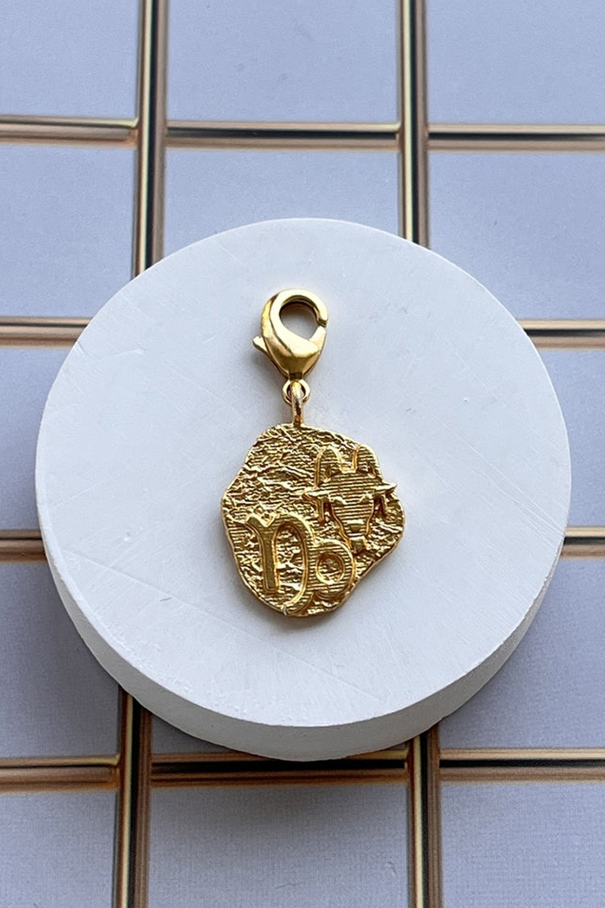 Gold Finish Zodiac Capricorn Charm Bracelet by MNSH at Pernia's Pop Up Shop