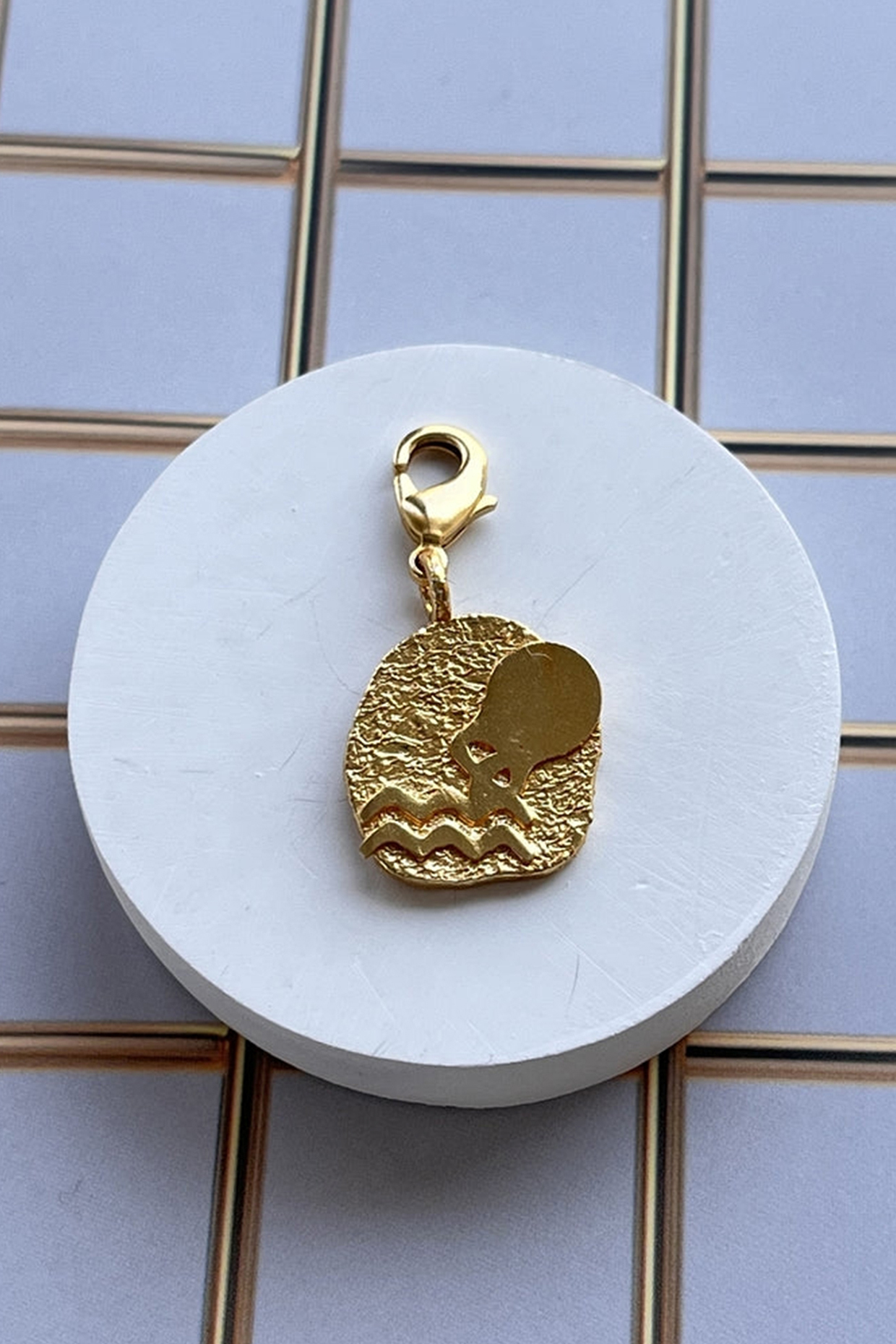 Gold Finish Zodiac Aquarius Charm Bracelet by MNSH at Pernia's Pop Up Shop