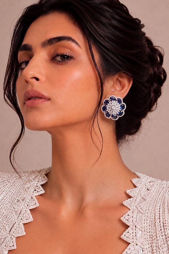 White Rhodium Finish Sapphire Stone Stud Earrings by MNSH at Pernia's Pop Up Shop