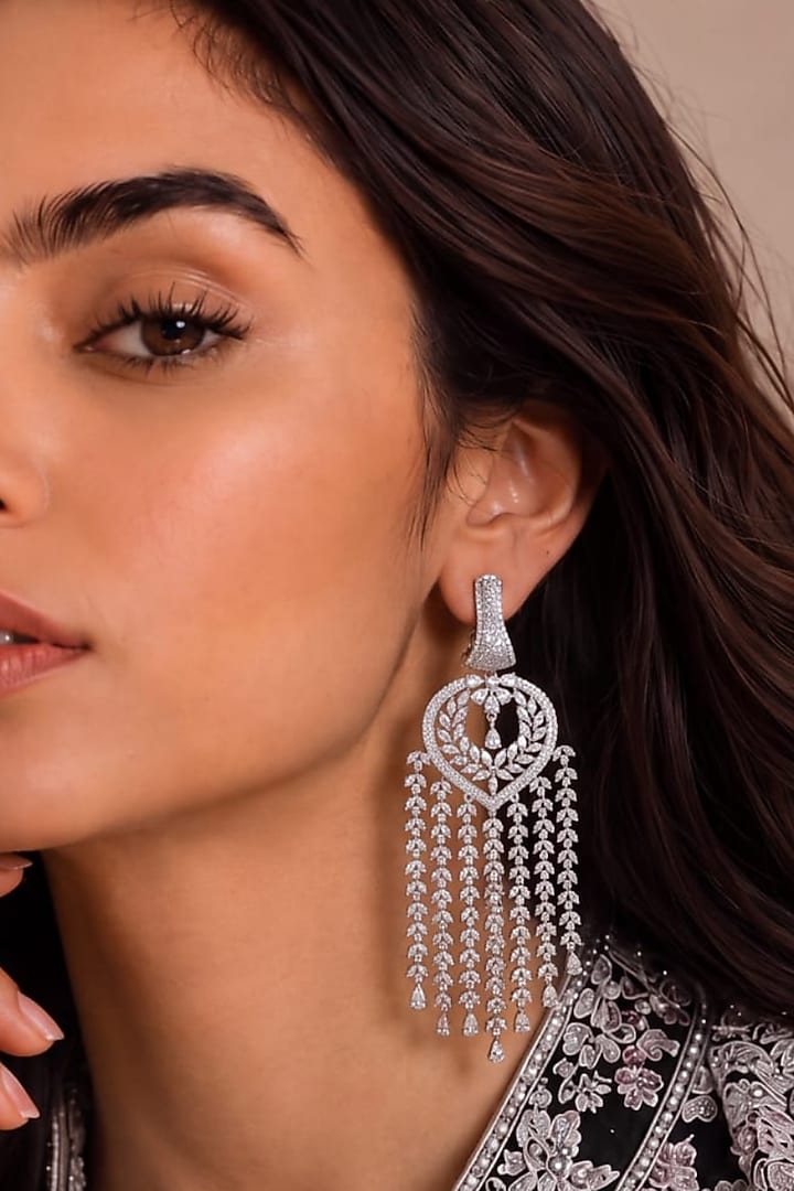 White Rhodium Finish Crystal Tassel Earrings by MNSH at Pernia's Pop Up Shop