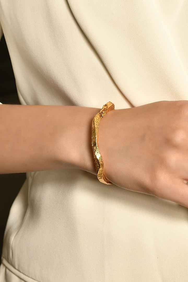 Gold Finish Diamond Glint Wave Bangle by MNSH at Pernia's Pop Up Shop