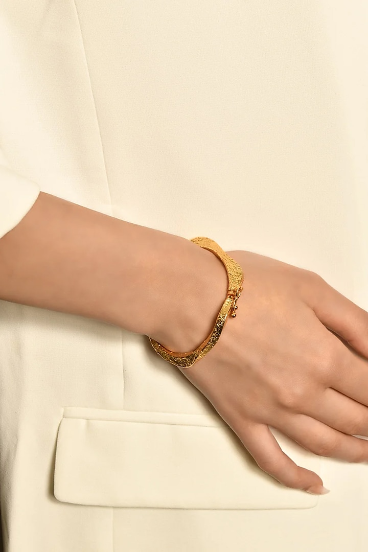 Gold Finish Diamond Glint Wave Bangle by MNSH at Pernia's Pop Up Shop