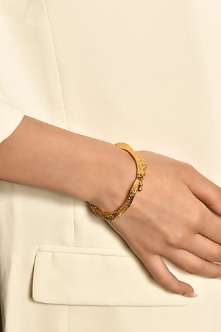 Gold Finish Diamond Glint Wave Bangle by MNSH